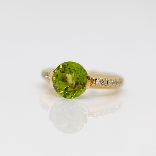 Gelbgold Ring 750er mit facettierten Peridot und Diamanten (37258)