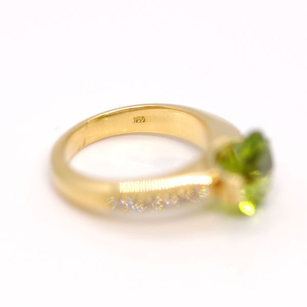 Gelbgold Ring 750er mit facettierten Peridot und Diamanten (37258)
