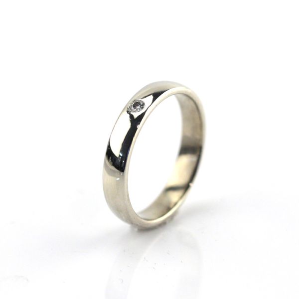 Weißgold Bandring 333er mit einem Diamanten im Brillantschliff 0,03ct (8891)